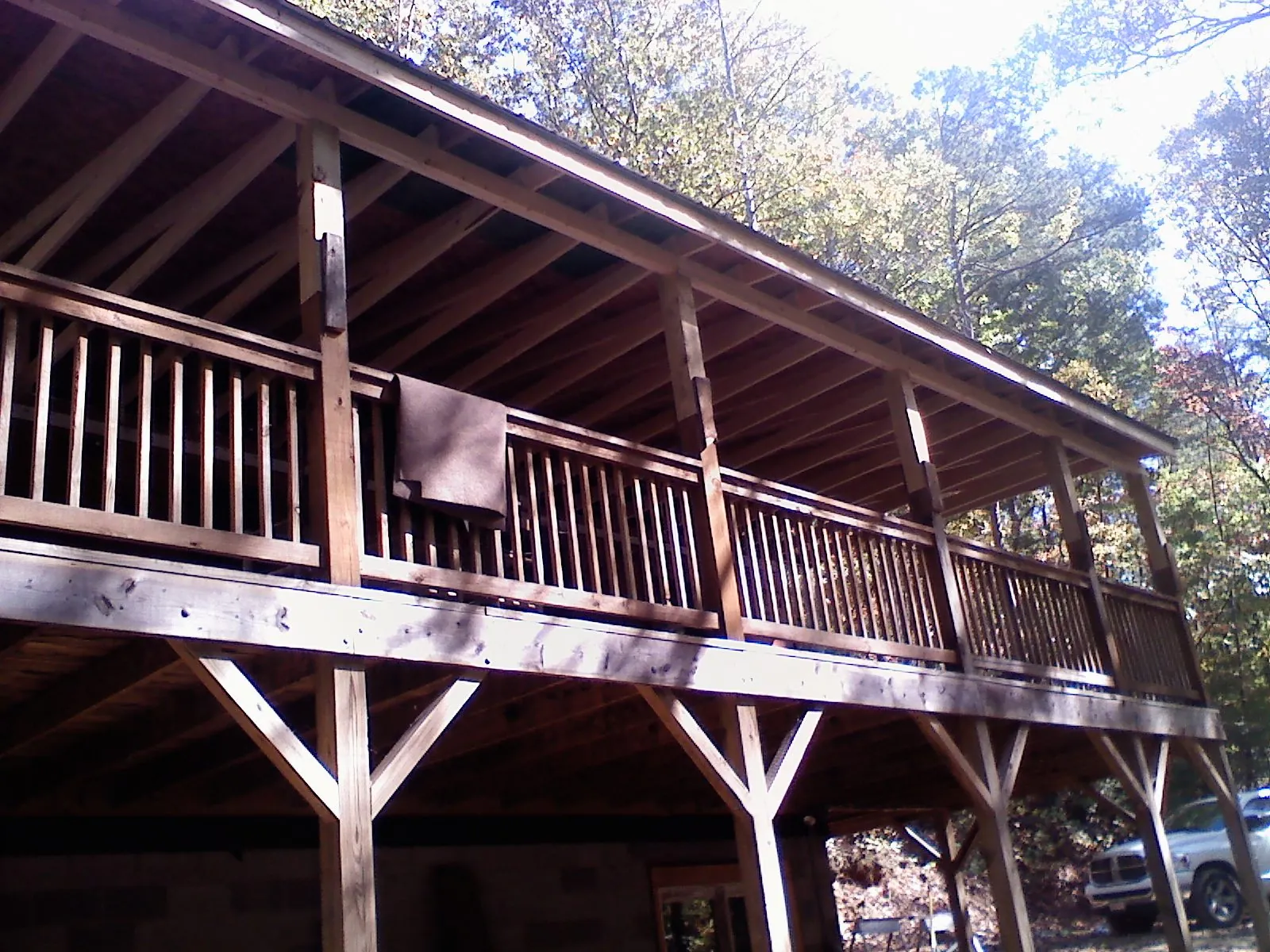 Timber framing under a new elevated porch and deck — Roof Leak Repair in Bakerstown by Roofing Brothers